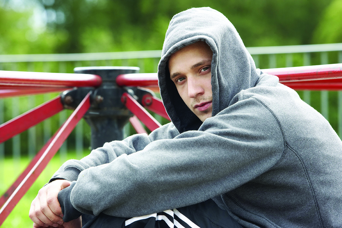 Boy on merry go round