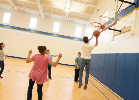 Students playing in the gym